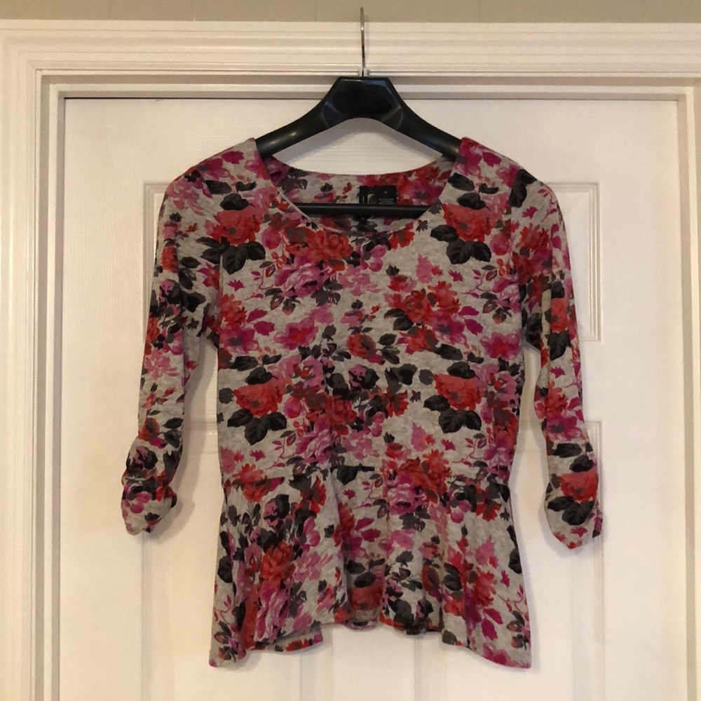 Quarter length peplum top